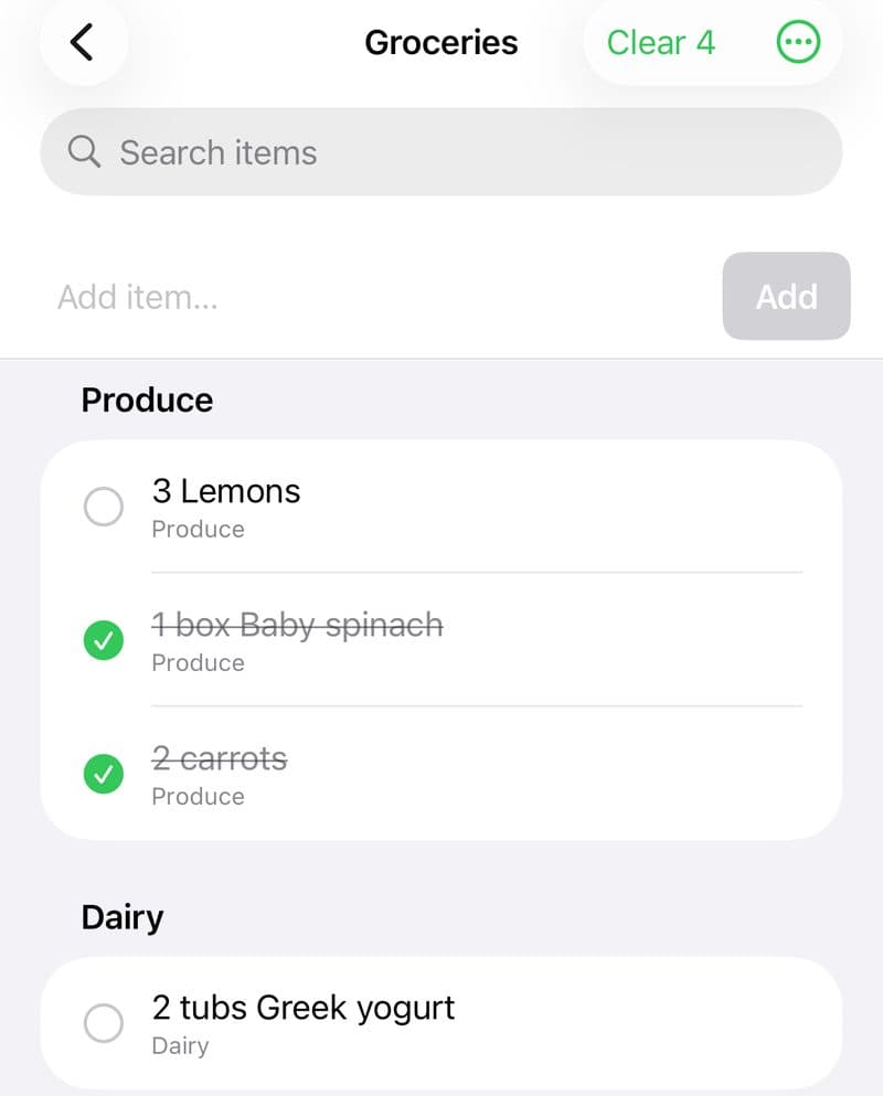 The shared grocery list in the Mindful Meal Plans app, sorted by aisle