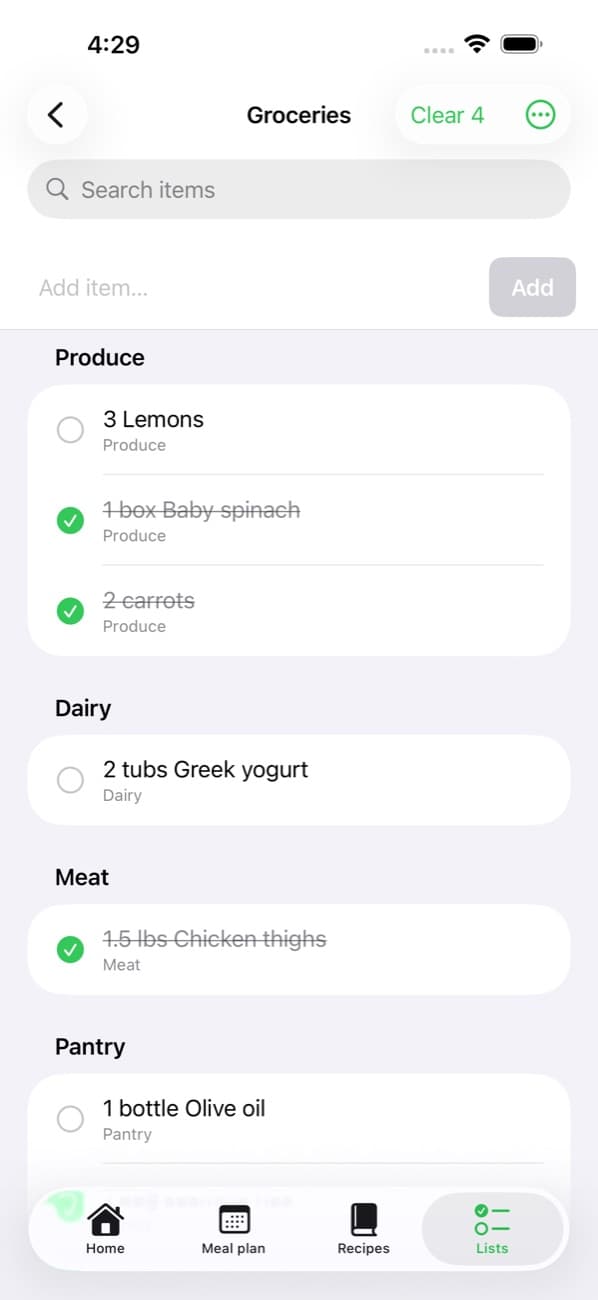 The shared grocery list in the Mindful Meal Plans app, sorted by aisle